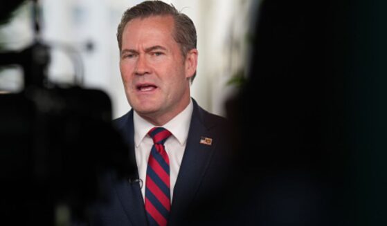 Mike Waltz standing across from a camera on White House grounds participating in an interview on May 1, 2025.