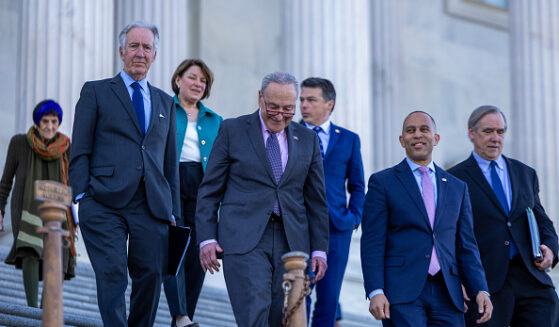 U.S. Senate Minority Leader Chuck Schumer (D-NY) and House Minority Leader Hakeem Jeffries (D-NY) walk out of the Capitol building to speak to the media on April 1, 2025