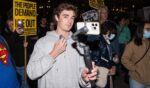 Investigative Journalist Nick Shirley recording anti-ICE protesters in New York City on Oct. 22, 2025.