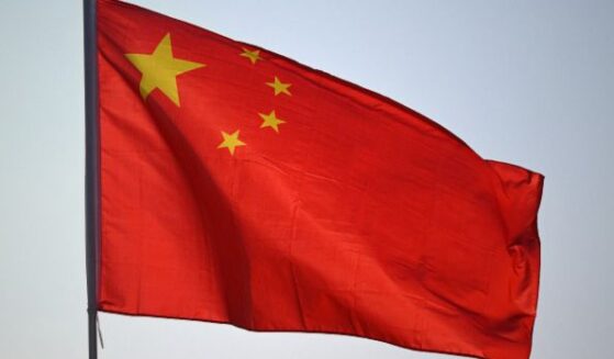 Chinese flag waves in Nanning, China on October 15, 2025.