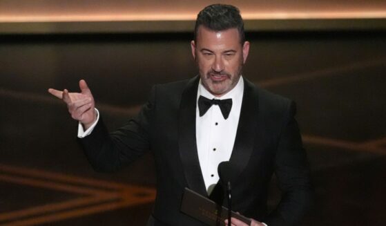 Jimmy Kimmel presents the award for best documentary short film Sunday during the Oscars in Los Angeles.