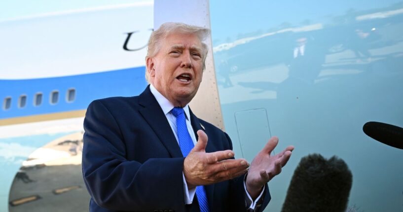 President Donald Trump speaks to reporters before boarding Air Force One at Palm Beach International Airport on March 23, 2026 in West Palm Beach, Florida.