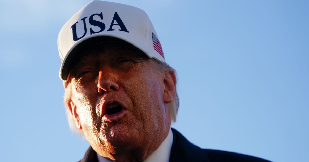 President Donald Trump speaks to the media before hopping on board Air Force One on March 13, 2026 at Joint Base Andrews, Maryland.