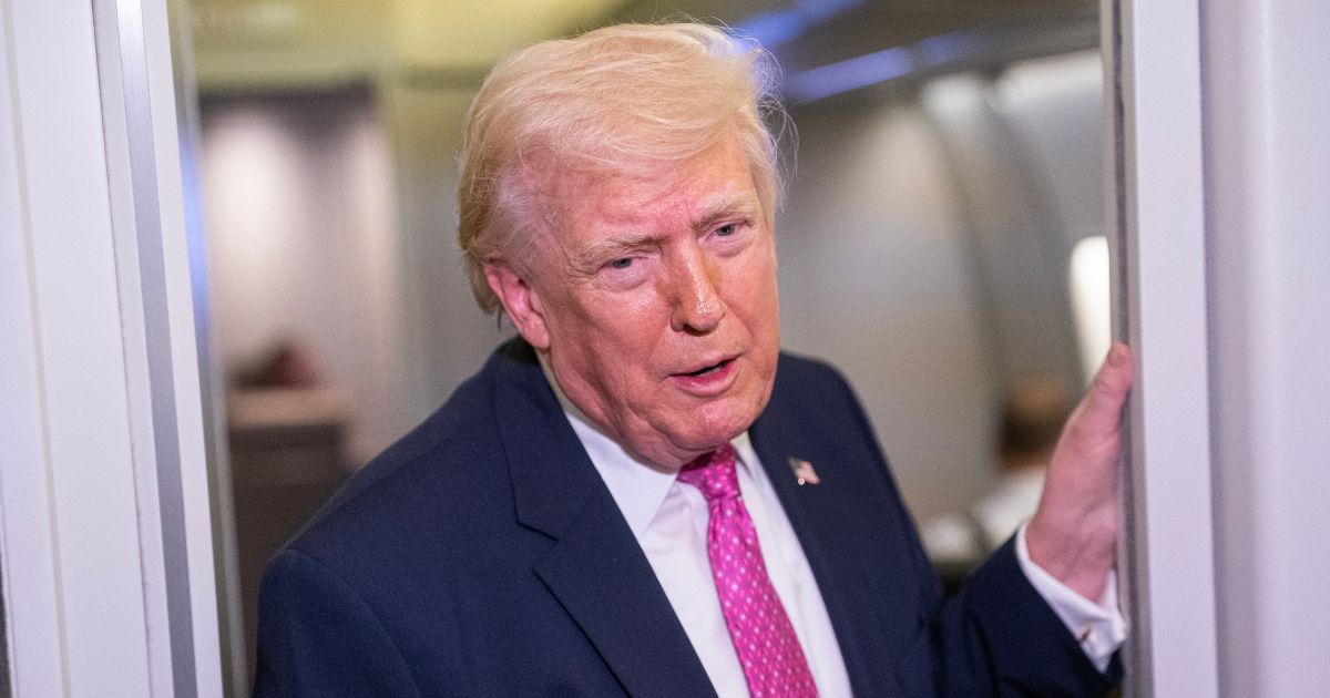 President Donald Trump speaks with reporters onboard Air Force One on March 29, 2026 while heading for Joint Base Andrews, Maryland, from West Palm Beach Florida.
