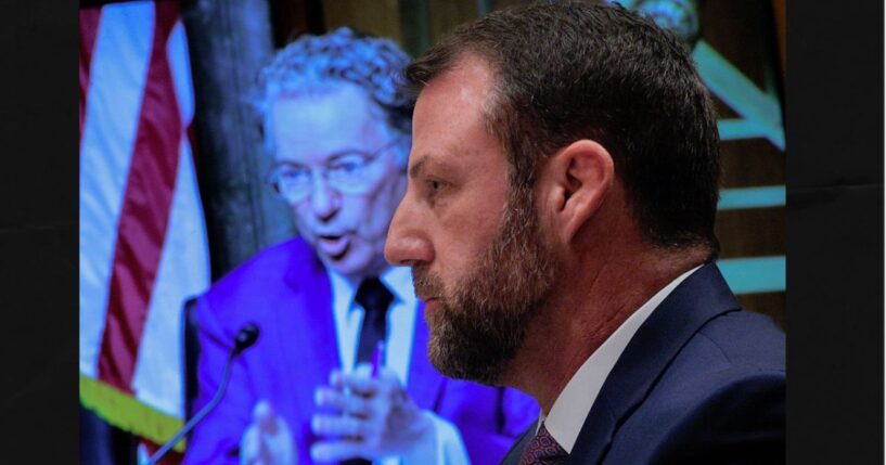 GOP Sen. Markwayne Mullin of Oklahoma is questioned by Senate Homeland Security and Governmental Affairs Committee Chairman Rand Paul of Kentucky Wednesday during Mullin's confirmation hearing to be the next Secretary of the Department of Homeland Security.