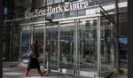 A person enters The New York Times building in New York City in a file photo dated Jan. 22 .