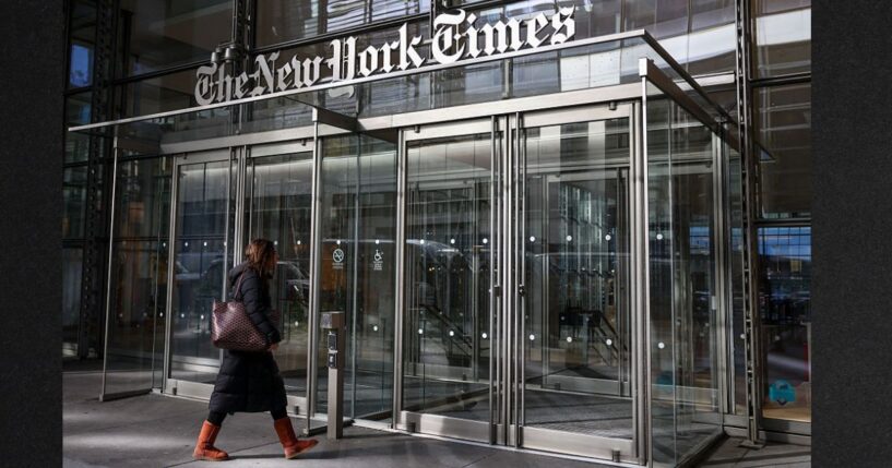 A person enters The New York Times building in New York City in a file photo dated Jan. 22 .