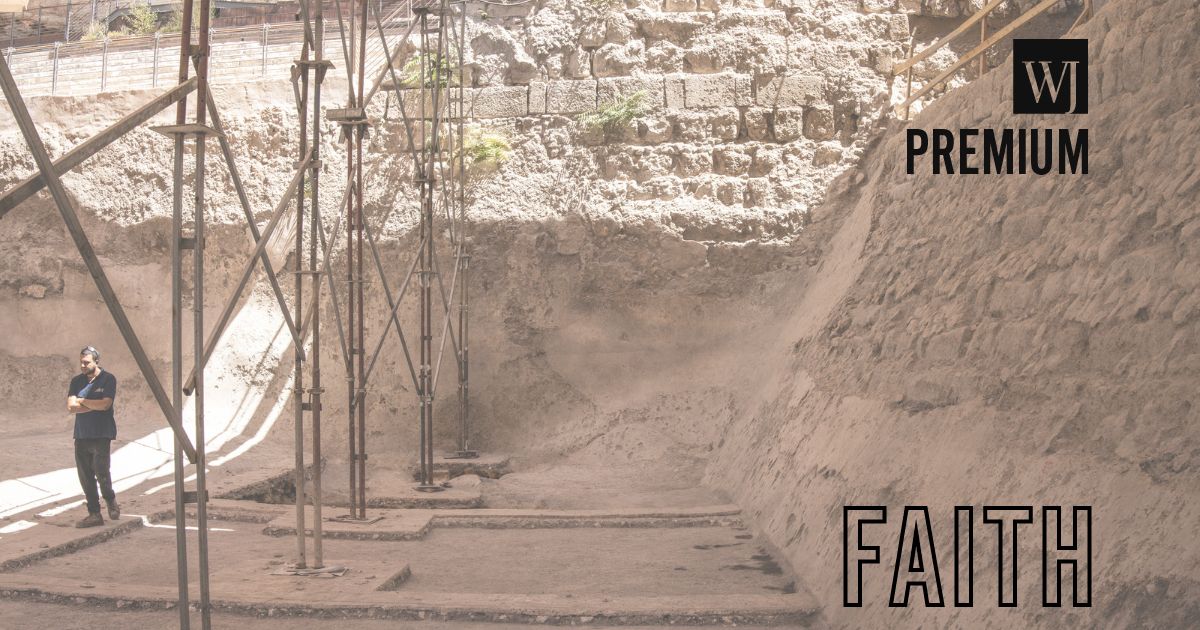 A man working for the Israeli Antiquities Authority walks through a newly uncovered dam in the city of David national Park in Jerusalem on Aug. 26, 2025.