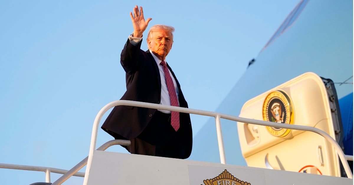 President Donald Trump departs Air Force One at Miami International Airport on Friday in Miami, Florida.