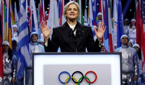International Olympic Committee President Kirsty Coventry is seen speaking Feb. 6 during the Olympic opening ceremony at the 2026 Winter Olympics in Milan, Italy. Coventry announced Thursday that men will be barred from competing as women in Olympic events.
