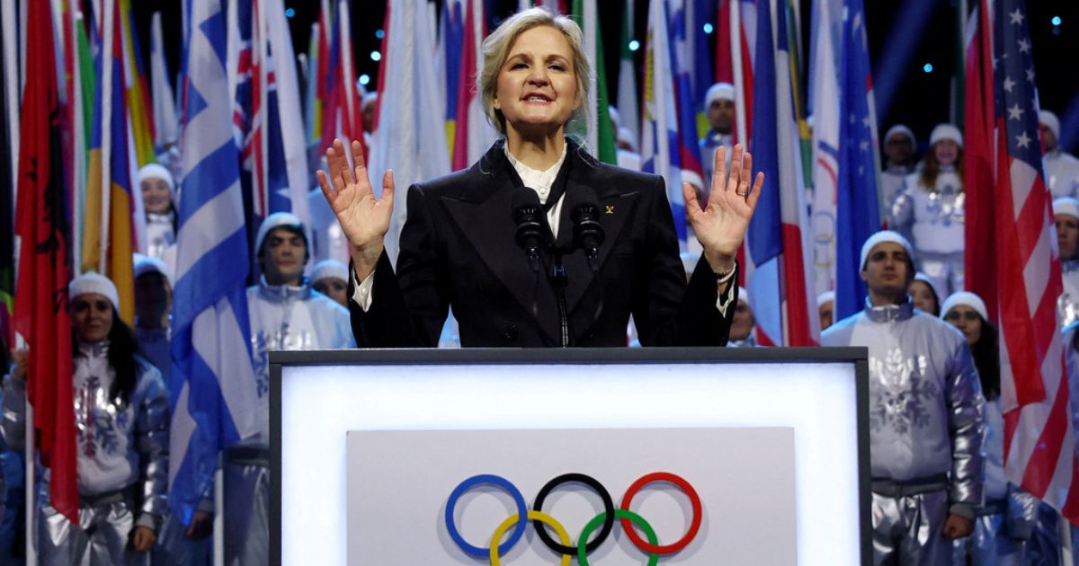 International Olympic Committee President Kirsty Coventry is seen speaking Feb. 6 during the Olympic opening ceremony at the 2026 Winter Olympics in Milan, Italy. Coventry announced Thursday that men will be barred from competing as women in Olympic events.