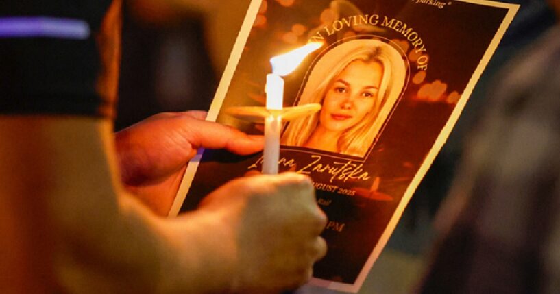 An image of murder victim Iryna Zarutska is pictured on a pamphlet at a vigil in her honor in September in Charlotte, North Carolina.