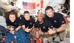 The Artemis II crew – from left, Mission Specialist Christina Koch, Mission Specialist Jeremy Hansen, Pilot Victor Glover, and Commander Reid Wiseman – pause for a group photo inside the Orion spacecraft on their way home. They are headed back to Earth for a splashdown in the Pacific Ocean Friday.