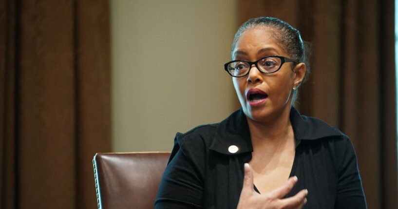 Rep. Karen Whitsett speaks as President Donald Trump, Vice President Mike Pence, and members of the Coronavirus Task Force listen during a meeting with patients in the Cabinet Room of the White House in Washington, D.C., on April 14, 2020.