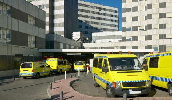 An ambulance in a hospital parking lot in Spain.