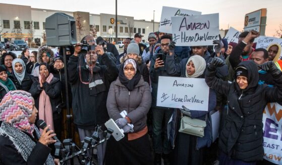 Rep. Ilhan Omar speaks during a rally at the Amazon fulfillment center in Shakopee, Minnesota, on Dec. 14, 2018.