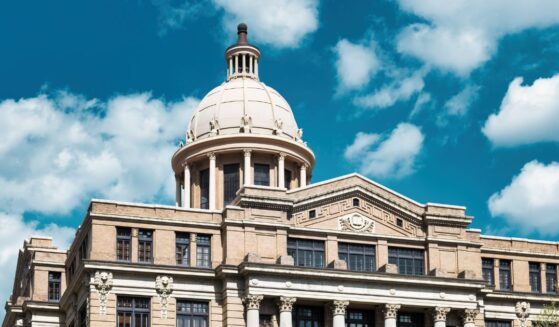 The Harris County Courthouse in downtown Houston, Texas, on a sunny day.