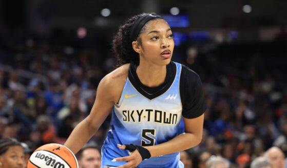 Angel Reese of the Chicago Sky dribbles the ball against the Connecticut Sun at Wintrust Arena on Sept. 3, 2025, in Chicago, Illinois.