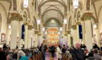 An audience waits in St Francis Cathedral for a Christmas concert to start on Dec. 9, 2025, in Santa Fe, New Mexico.