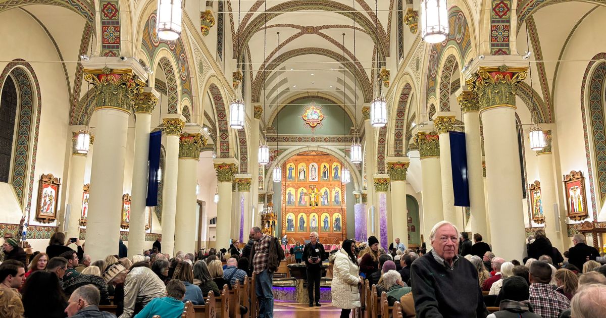 An audience waits in St Francis Cathedral for a Christmas concert to start on Dec. 9, 2025, in Santa Fe, New Mexico.