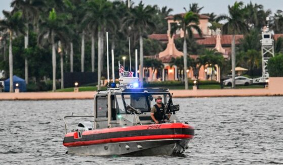 Members of the U.S. Coast Guard patrol the access point near President Donald Trump's Mar-a-Lago resort during the "No Kings" national day of protest, in Palm Beach, Florida, on May 28, 2026.