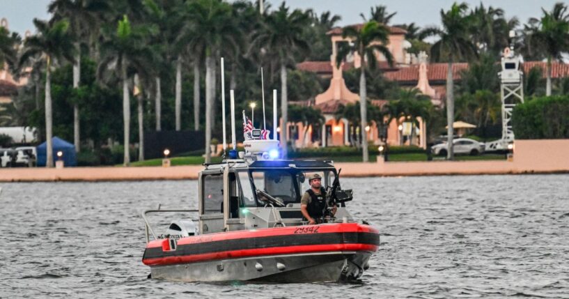 Members of the U.S. Coast Guard patrol the access point near President Donald Trump's Mar-a-Lago resort during the "No Kings" national day of protest, in Palm Beach, Florida, on May 28, 2026.