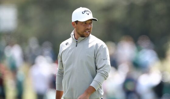 Xander Schauffele looks on from the 15th green during a practice round prior to the 2026 Masters Tournament at Augusta National Golf Club on April 8, 2026, in Augusta, Georgia.