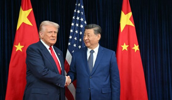 President Donald Trump and Chinese President Xi Jinping shake hands as they arrive for talks at the Gimhae Air Base, located next to the Gimhae International Airport in Busan on Oct. 30, 2025.
