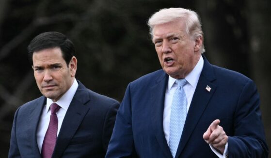 President Donald Trump walks with Secretary of State Marco Rubio as he departs from the South Lawn of the White House in Washington, D.C., on March 20, 2026, for his Mar-a-Lago residence, where he will spend the weekend.