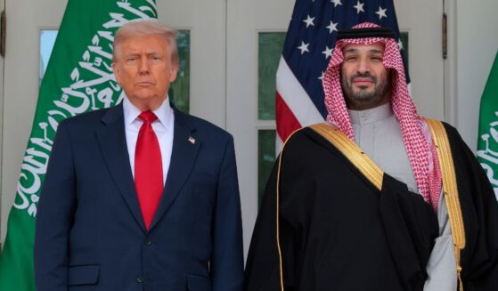 President Donald Trump and Crown Prince and Prime Minister Mohammed bin Salman of Saudi Arabia pause for photographs along the West Wing Colonnade at the White House on Nov. 18, 2025, in Washington, D.C.