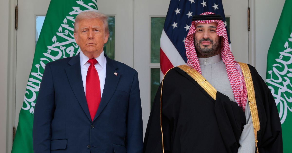 President Donald Trump and Crown Prince and Prime Minister Mohammed bin Salman of Saudi Arabia pause for photographs along the West Wing Colonnade at the White House on Nov. 18, 2025, in Washington, D.C.