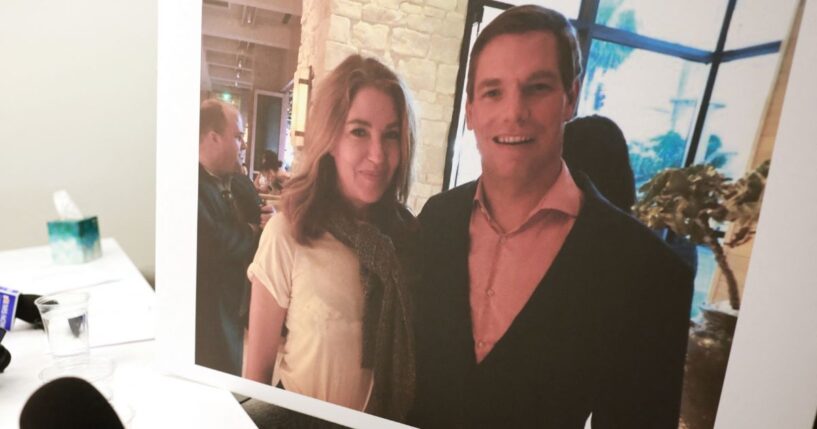 A picture showing Lonna Drewes and former Rep. Eric Swalwell, a Democrat from California, is shown during a press conference where she described her claims about sexual misconduct by Swalwell in Beverly Hills, California, on April 14, 2026.