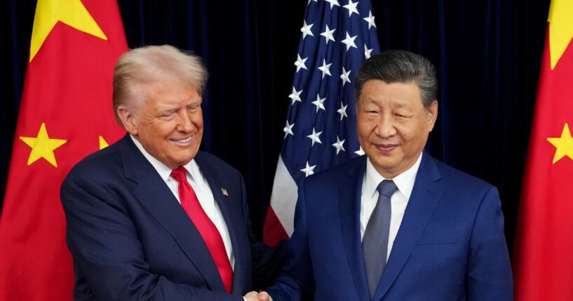 President Donald Trump greets Chinese President Xi Jinping ahead of a bilateral meeting at Gimhae Air Base on Oct. 30, 2025, in Busan, South Korea.