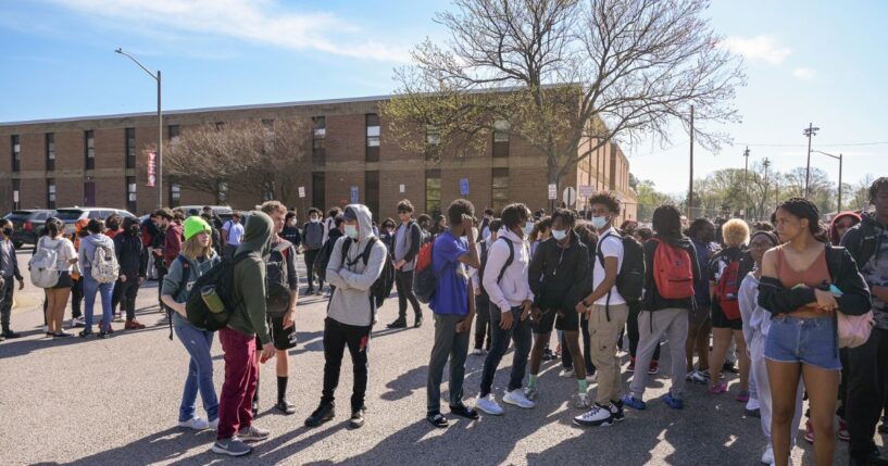 Mt. Vernon High School students participate in a student walkout against the potential confirmation of Superintendent Michelle Reid in Alexandria, Virginia, on April 14, 2022.
