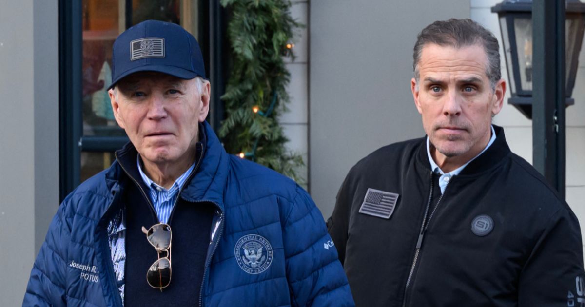 President Joe Biden and son Hunter Biden step out of a bookstore while shopping in Nantucket, Massachusetts, on Nov. 29, 2024.