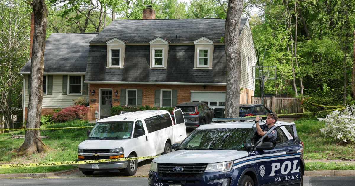 Law enforcement secure a crime scene outside the home of former Virginia Lt. Gov. Justin Fairfax on April 16, 2026, in Annandale, Virginia.