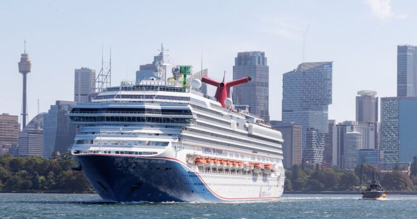 Large Carnival Splendor cruise ship sailing in Sydney Harbor with the skyline in the background in Sydney in the state of New South Wales in southeastern Australia on Feb. 13, 2025.
