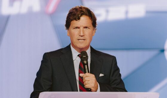 Conservative political commentator and podcast host Tucker Carlson speaks at Turning Point USA's annual AmericaFest conference, in remembrance of late right-wing political activist Charlie Kirk, in Phoenix, Arizona, on Dec. 18, 2025.