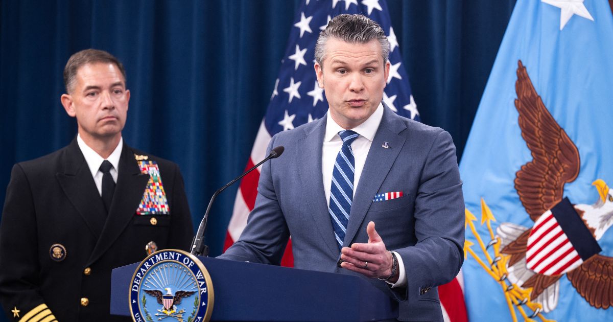 Secretary of War Pete Hegseth speaks alongside CENTCOM Commander Admiral Brad Cooper during a press briefing at the Pentagon in Washington, D.C., on April 16, 2026.
