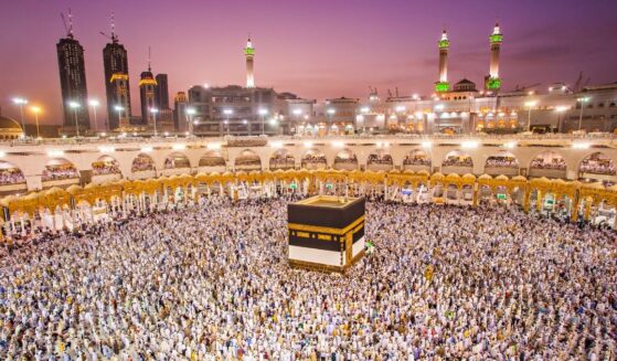 Muslim pilgrims from all around the world doing tawaf, praying around the Kaabah in Mecca, Saudi Arabia.