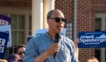 Jay Jones, who is running to become Virginia's attorney general in 2025, speaks to the audience during Abigail Spanberger's bus tour stop at Stacy C. Sherwood Community Center in Fairfax, Virginia, on June 26, 2025.