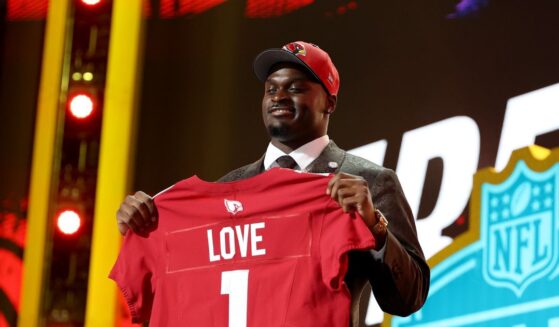 Jeremiyah Love of Notre Dame celebrates after being selected third overall pick by the Arizona Cardinals during Round One of the 2026 NFL Draft at Acrisure Stadium on April 23, 2026, in Pittsburgh, Pennsylvania.