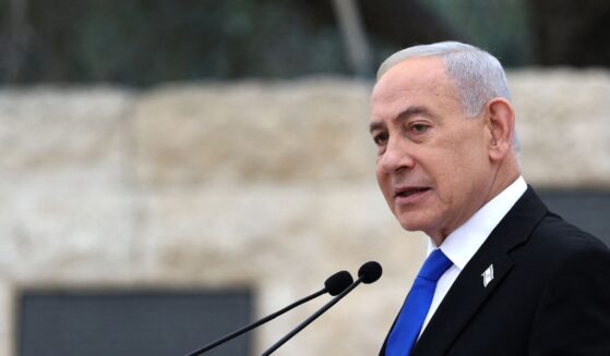 Israeli Prime Minister Benjamin Netanyahu speaks during a ceremony commemorating Israel's Remembrance Day for fallen soldiers, or Yom HaZikaron, at the Military Cemetery on Mount Herzl in Jerusalem on April 21, 2026.
