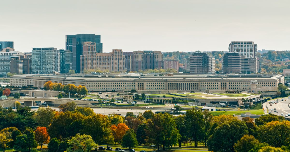 A helicopter shot of the Pentagon, the headquarters of the United States Department of War, in Arlington County, Virginia, across the Potomac River from Washington, D.C.
