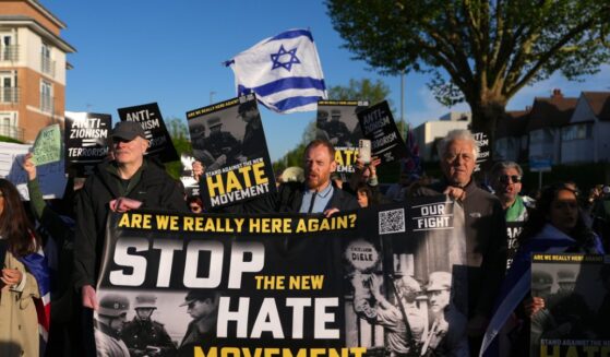 People participate in an "Anti-Zionism = Terrorism" protest, organized by the pressure group Stop the Hate in Golders Green following the stabbing of two people earlier on April 29, 2026, in the Golders Green area of London, England.