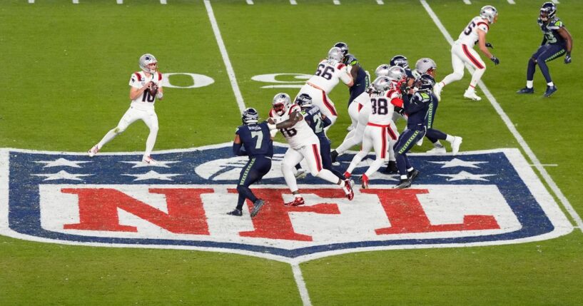 Drake Maye #10 of the New England Patriots drops back to pass against the Seattle Seahawks during the fourth quarter in Super Bowl LX Feb. 8 in Santa Clara, California.