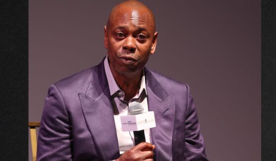 Comedian Dave Chappelle, seen in an August photo, refuses to feel guilty for his jokes.
