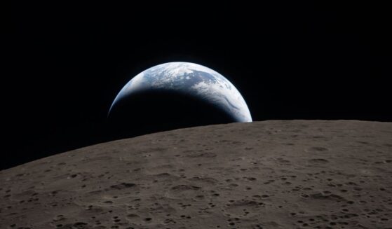"Earthset" is captured through the Orion spacecraft window at 6:41 p.m. EDT, Monday during the Artemis II crew’s flyby of the moon.