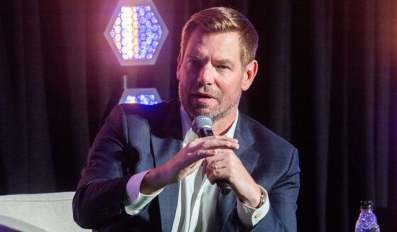 Then-Rep. Eric Swalwell of California, who resigned in disgrace Tuesday amid sexual assault allegations, is seen in a file photo from February, speaking at a California governor candidate forum in Los Angeles.