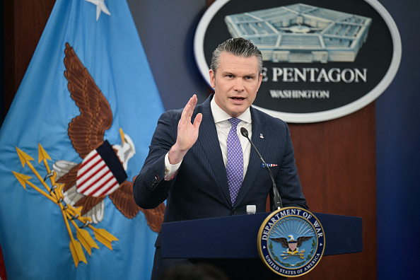 Secretary of War Pete Hegseth speaks at press room podium at the Pentagon on March 31, 2026.